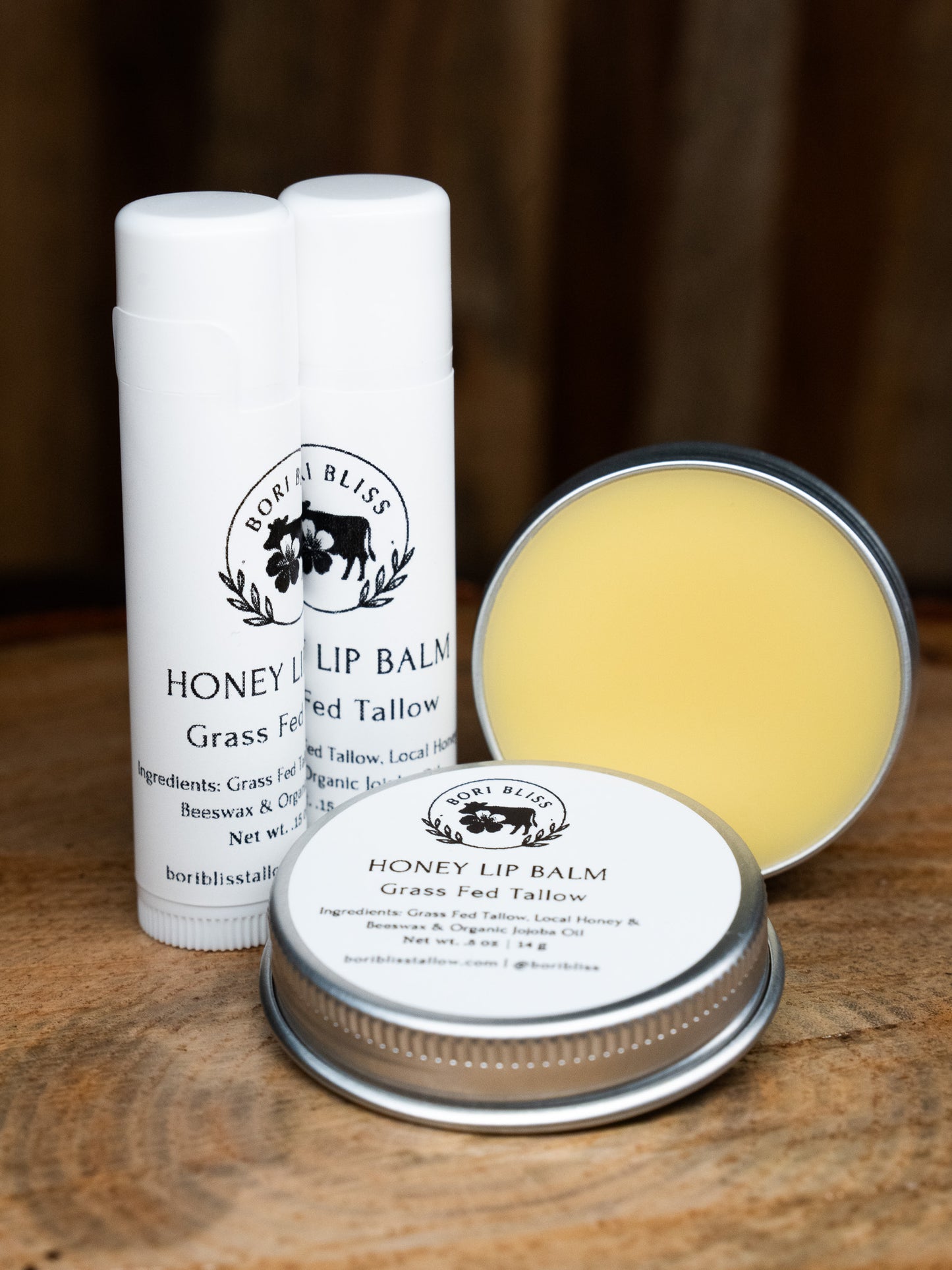 Bori Bliss Tallow Honey Lip Balm in a convenient tube and small tin tub for all-natural, lasting lip hydration.